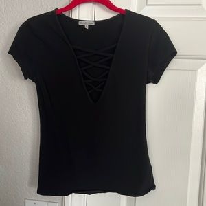 Simple black tee with criss cross front